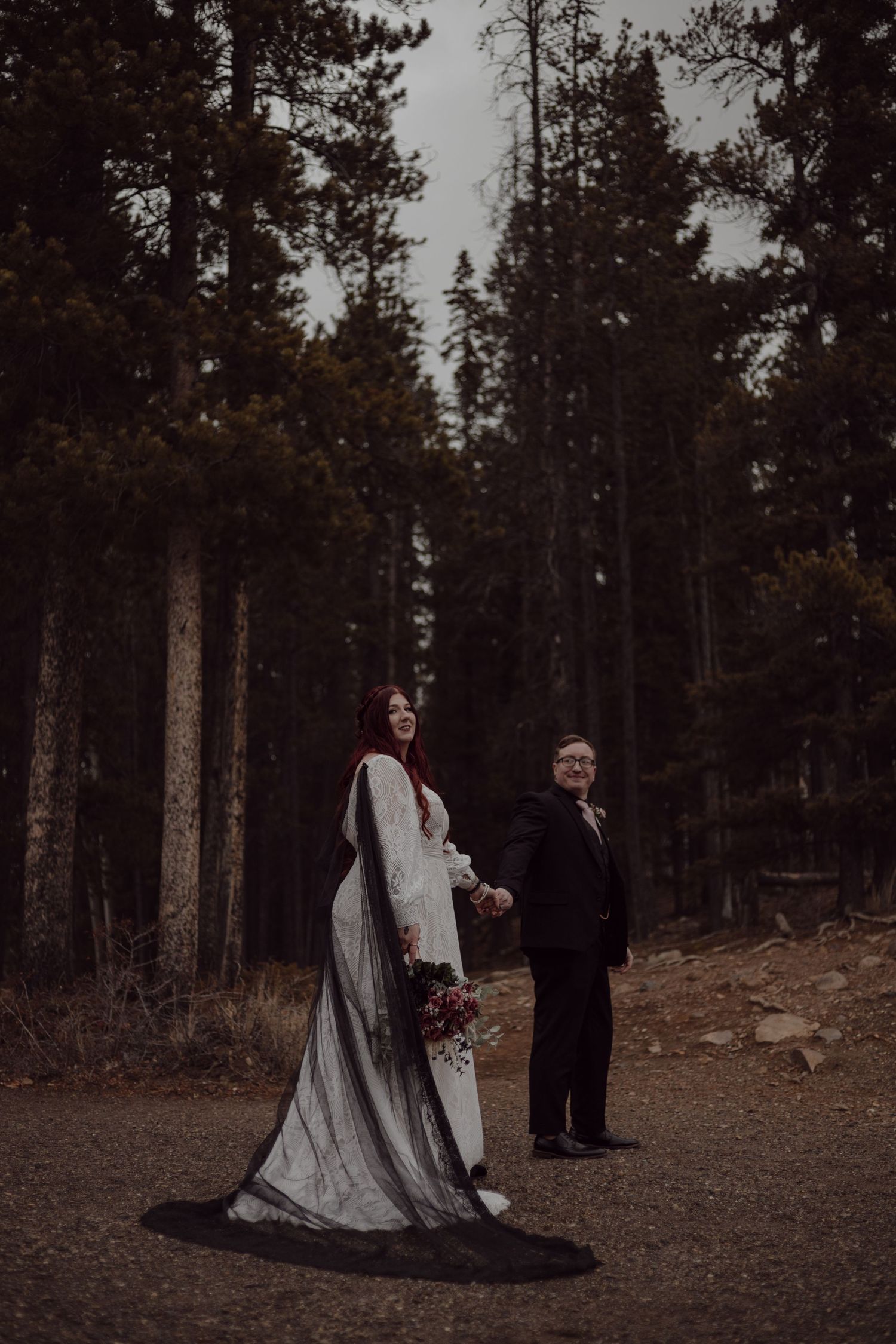 A small and intimate ceremony in front of the stunning Rocky mountain back drop in Lake Minnewanka.