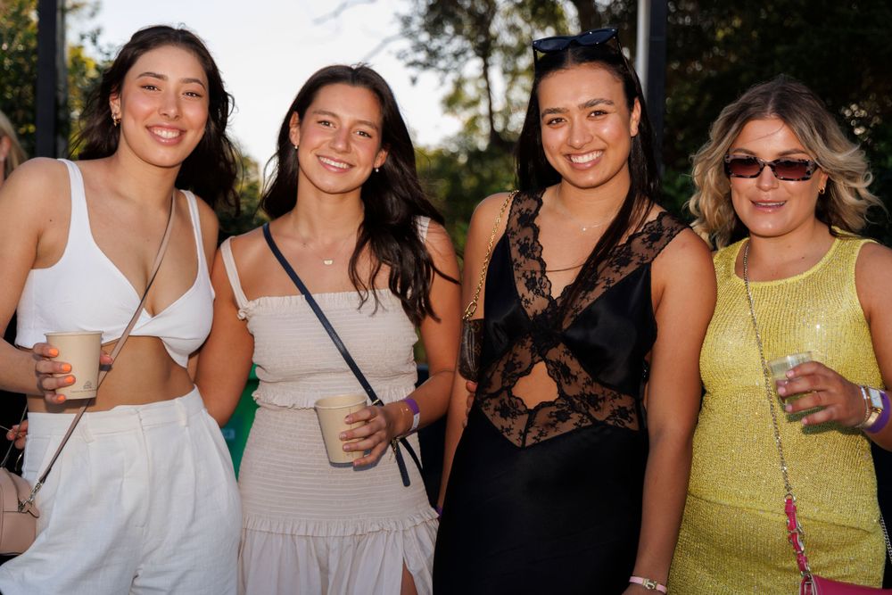 Four ladies enjoying ladies day event at local rugby club captured by brisbane events photographer