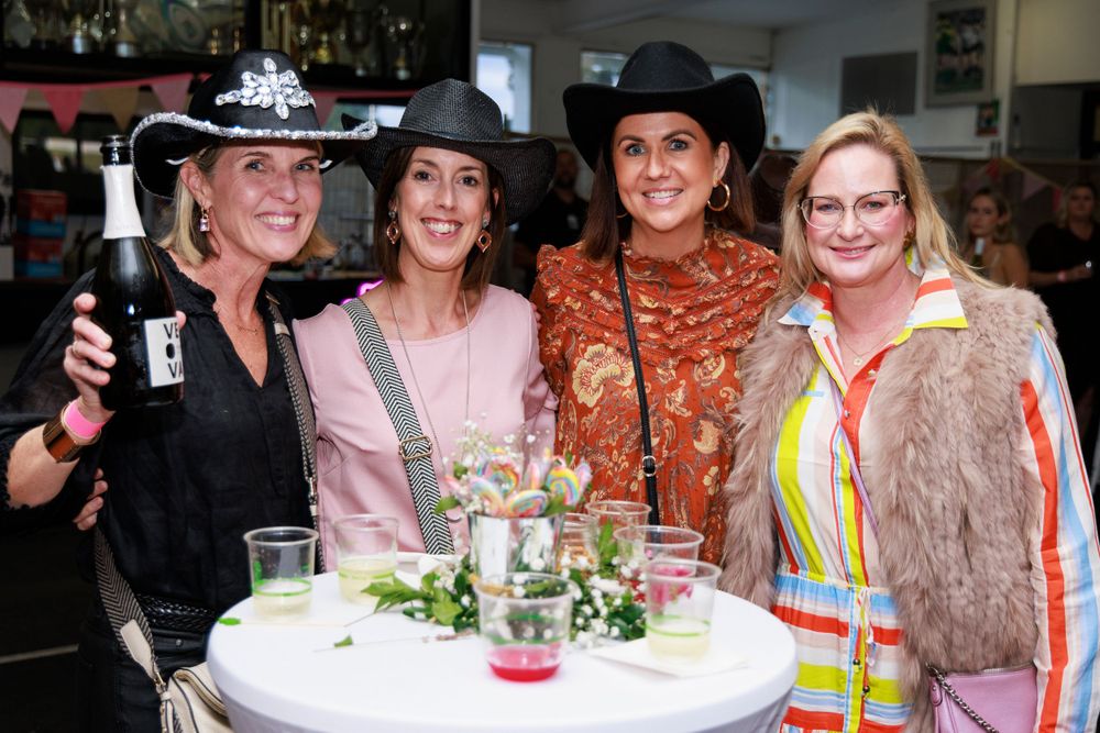 Four ladies enjoying souths ladies day event at local rugby club captured by brisbane events photographer