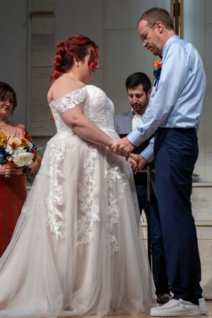 A sequence of wedding ceremony photos shows a couple exchanging rings during their outdoor ceremony.
