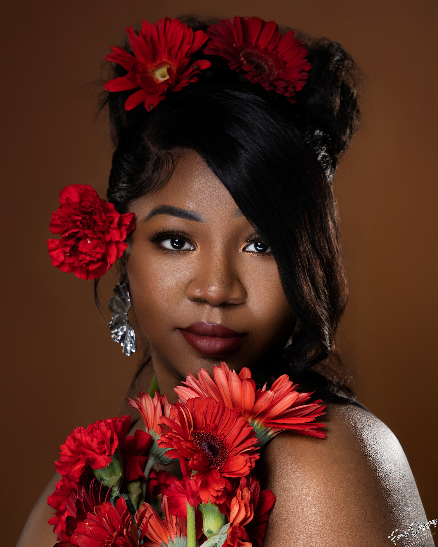 A glamorous portrait against a dark backdrop features a model in a sparkly black dress with red roses and a crown.