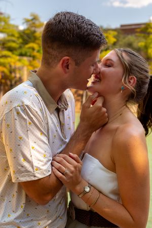 A sequence of five romantic wedding photos showing a couple sharing intimate kisses in golden sunlight.