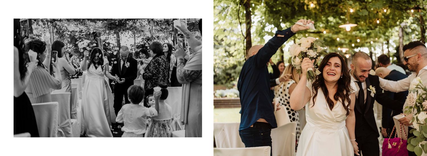 Joyful wedding couple celebrating recessional with raised hands amid cheering guests outdoors.