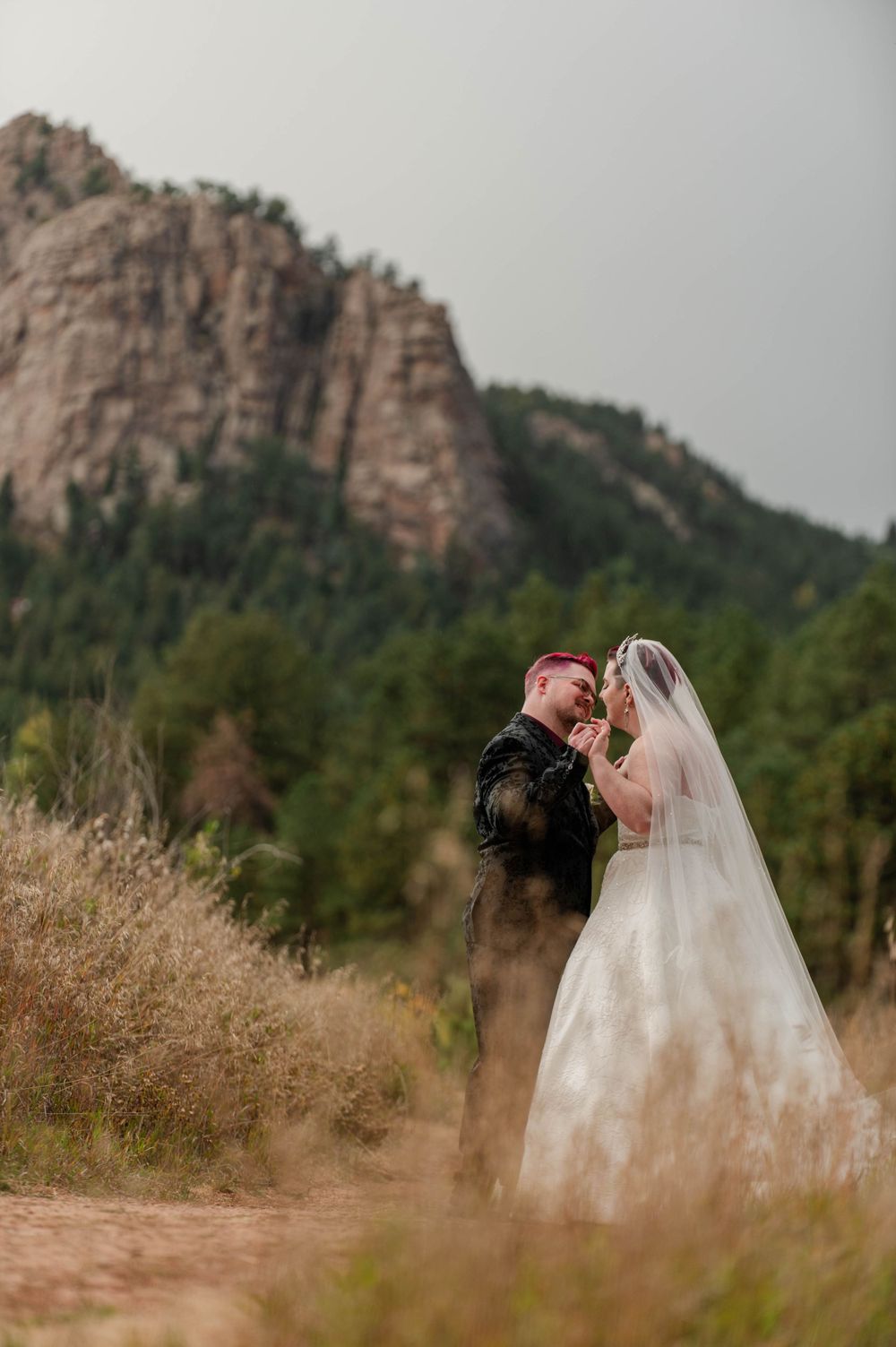 Wedding couple by a lake. Photography.
