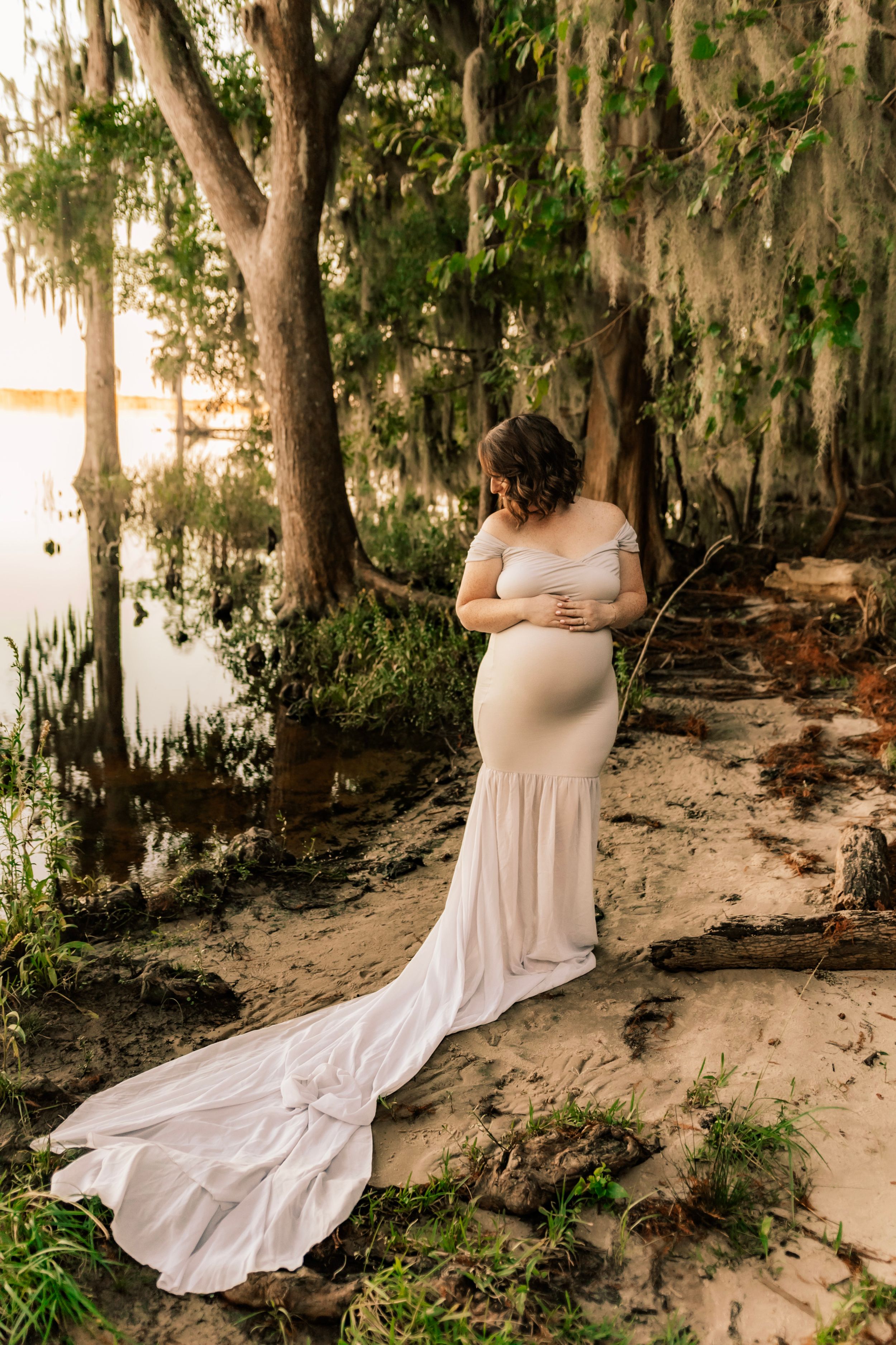 Best Jacksonville, NC Photographers.maternity session in field.
