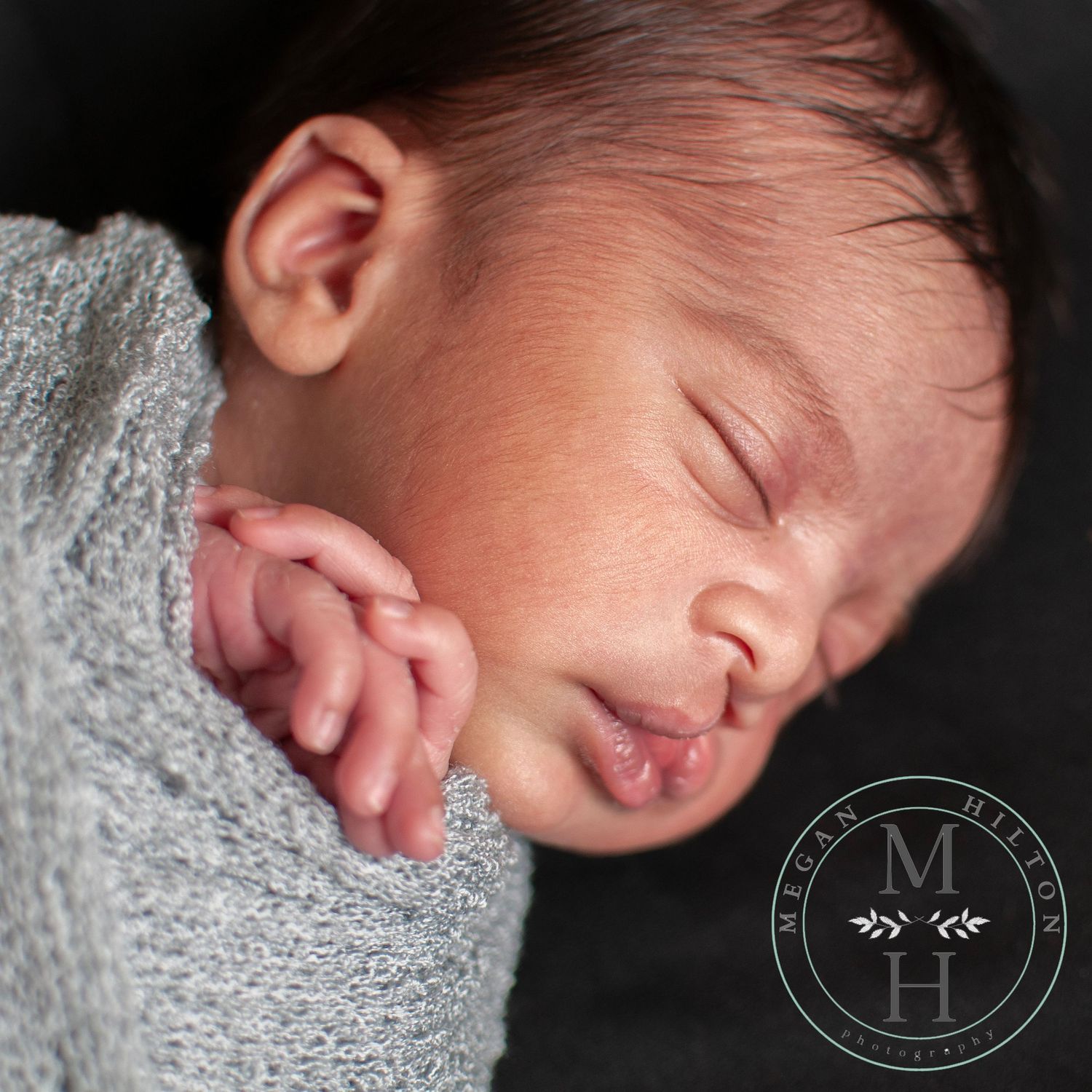 close up of newborn baby photograph