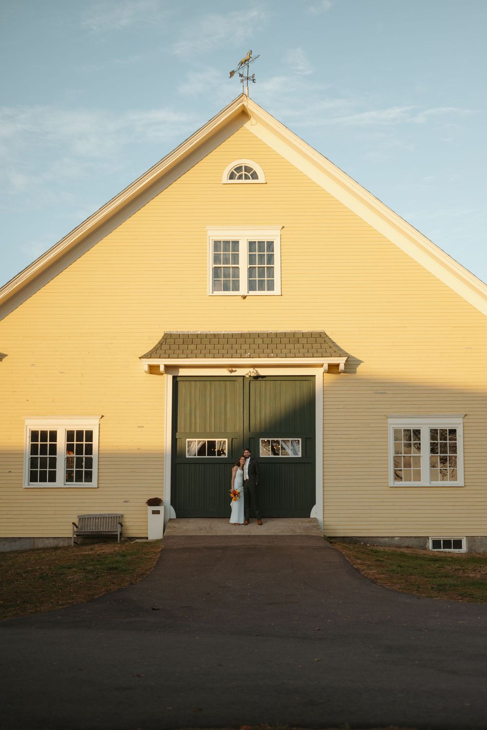 A series of photos showing a yellow barn with white trim and a weather vane being closed up with green garage doors.
