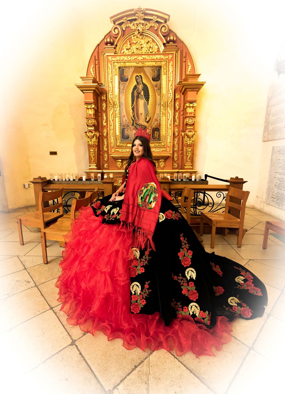 Ornate church interior with religious icons and a flowing red dress against white walls.