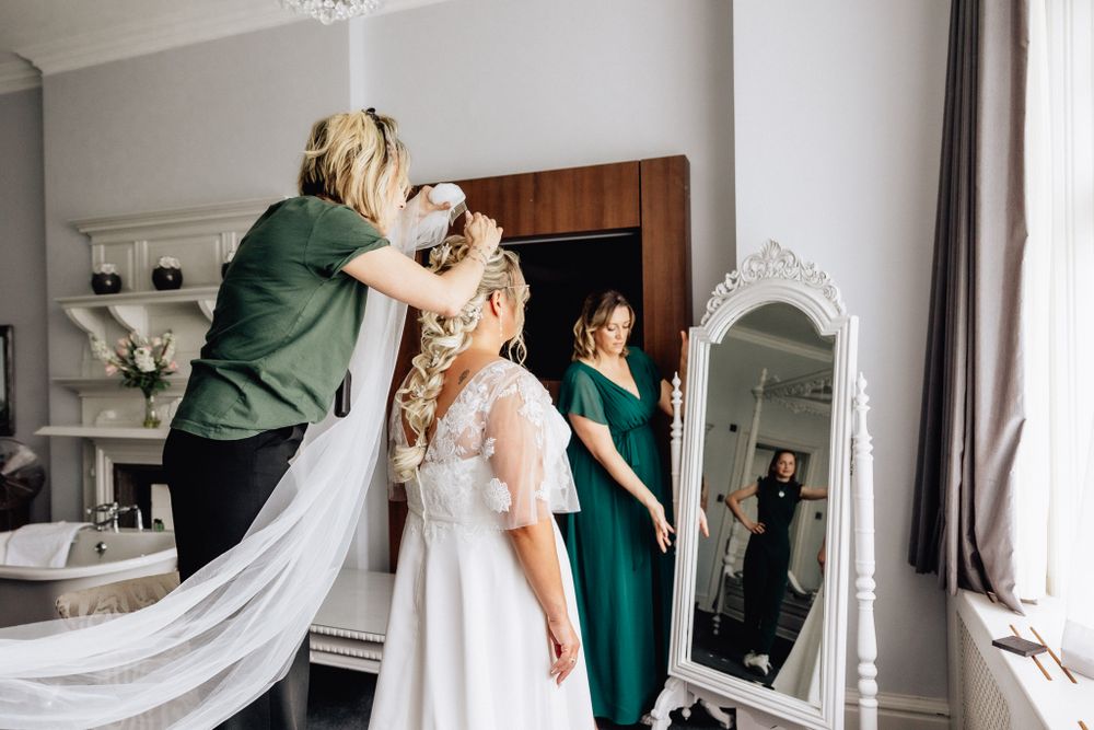 Bride getting veil on Stanhill Court Hotel