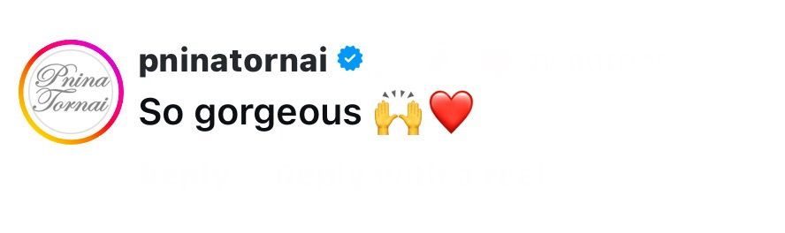 A simple Instagram comment showing text "So gorgeous" with heart and raised hands emojis from a verified user.