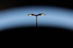 Creative photo of a parking lot light post