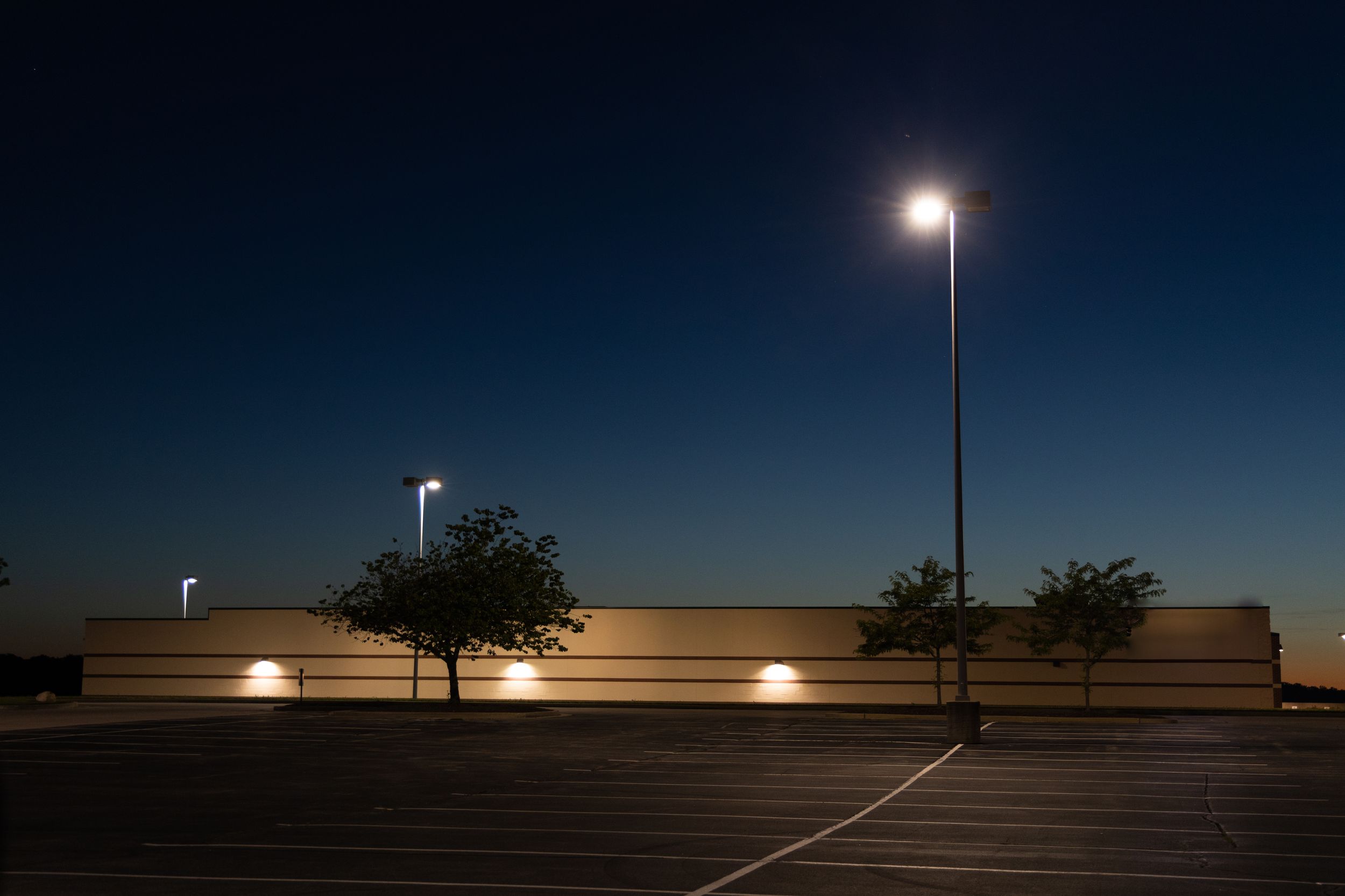 Creative photo of a commercial parking lot and building