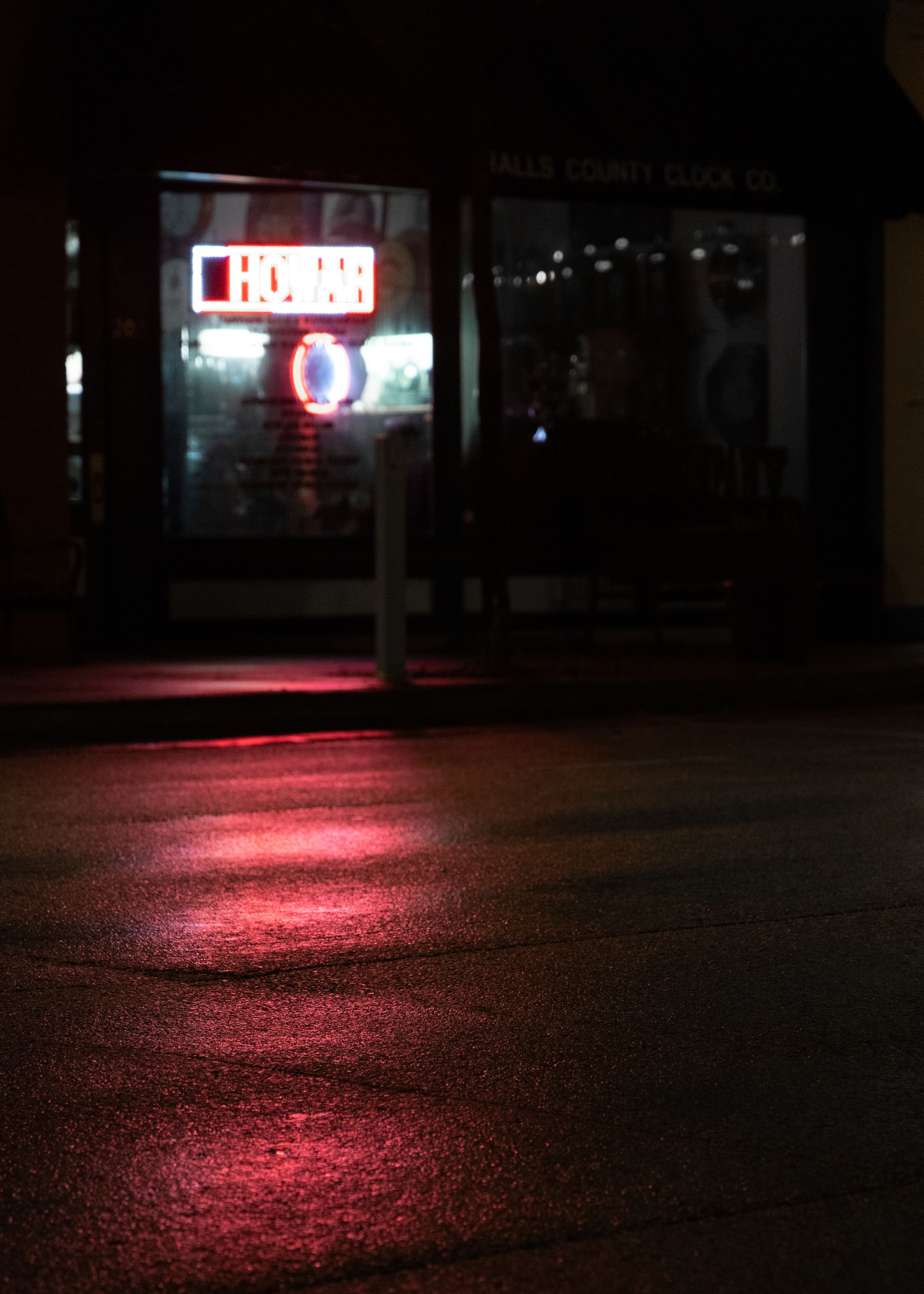 Creative photo of a storefront at night in small town America