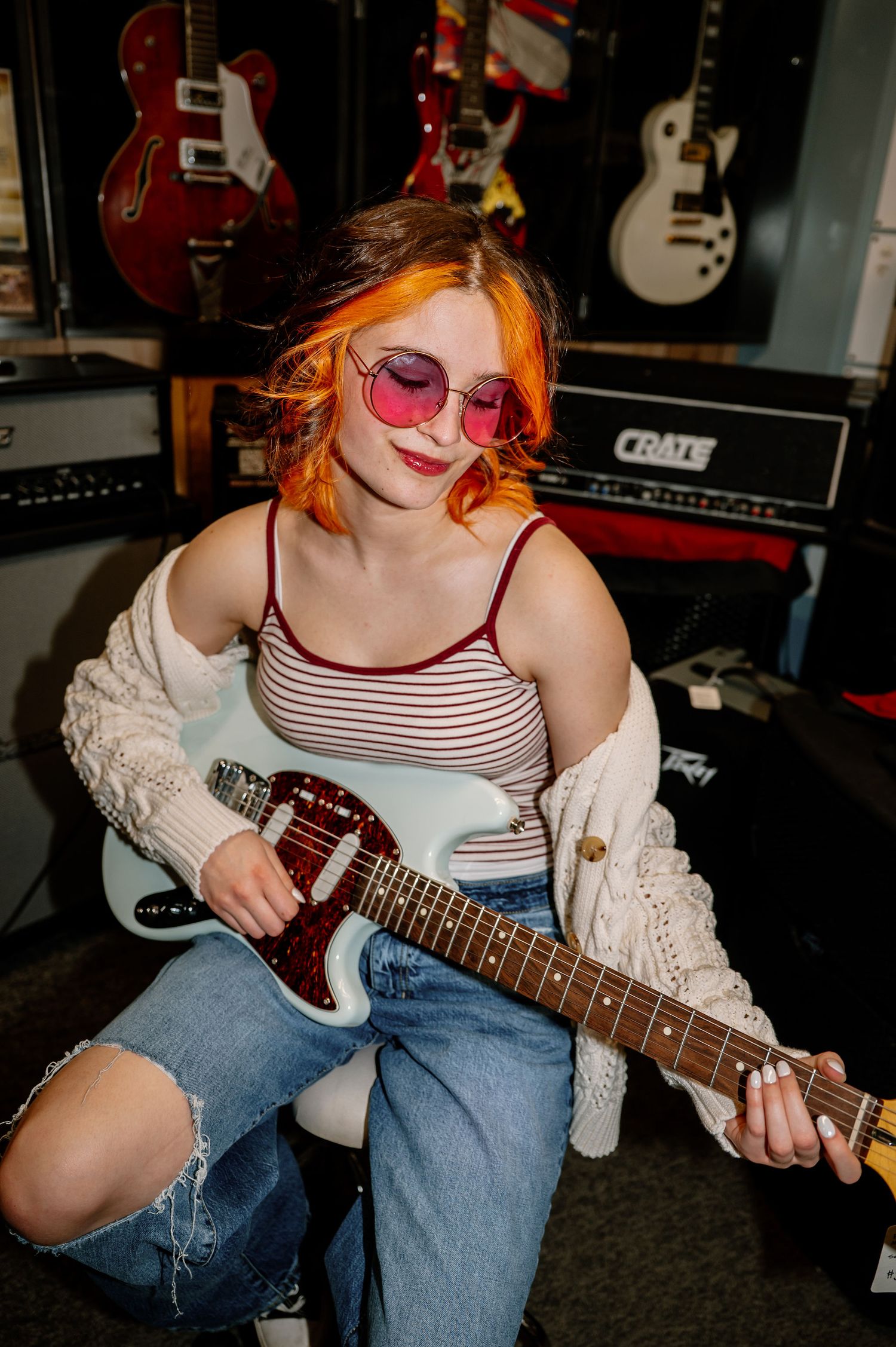 Fun senior photos with an electric guitar at Hot Poop in Walla Walla