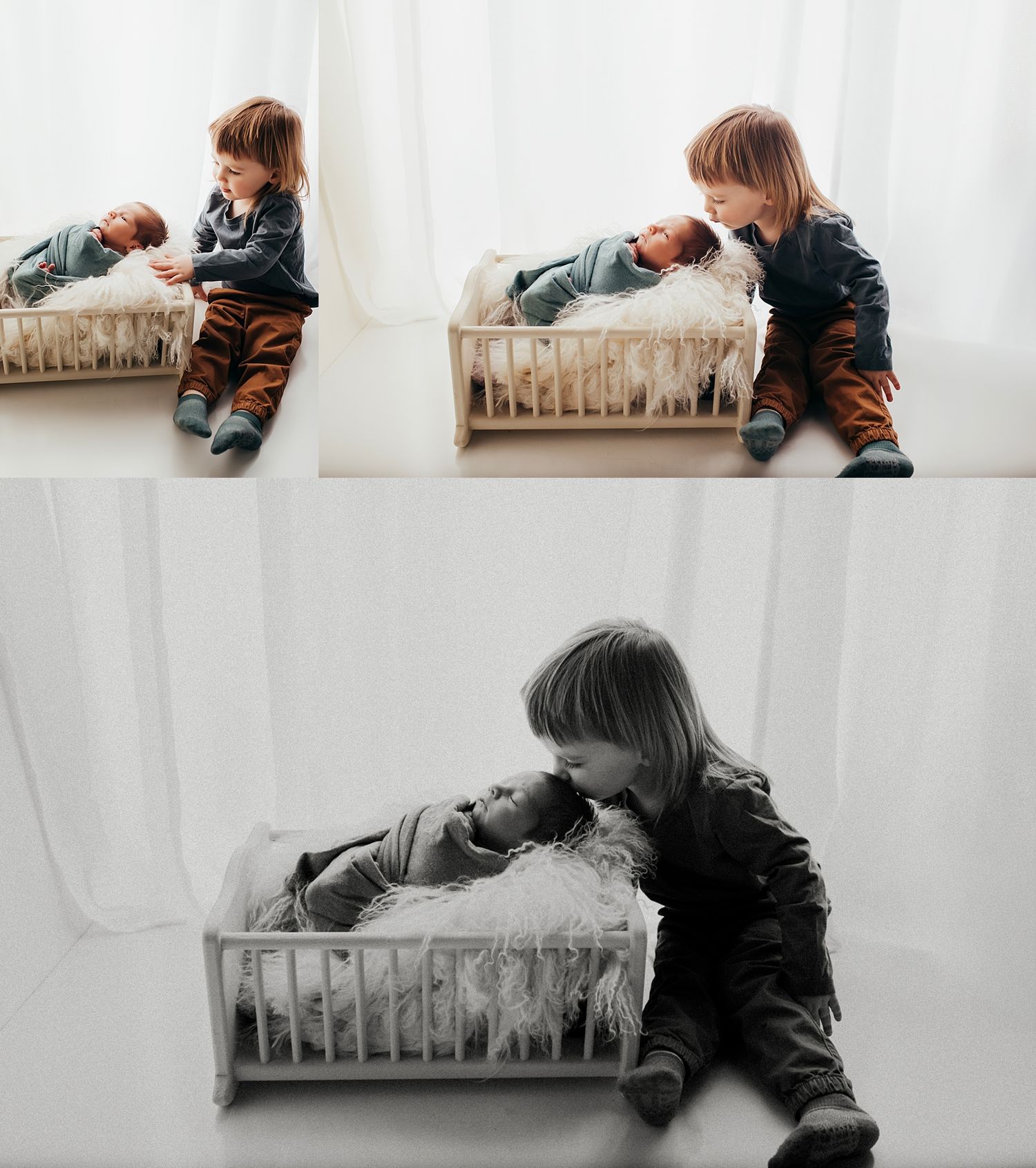 A young boy lovingly kisses his newborn sibling in a wooden prop bed during a studio newborn photography session.