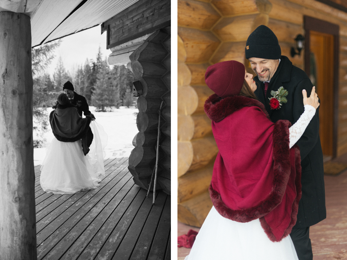bride and groom dance on the porch of a log cabin in the snow