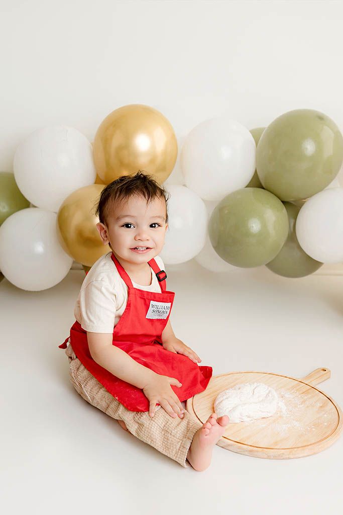 2nd birthday cake smash photo with a pizza theme in Menifee California.