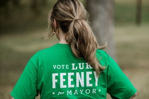 Campaign t-shirt for Luke Feeney mayoral candidate shown from behind.