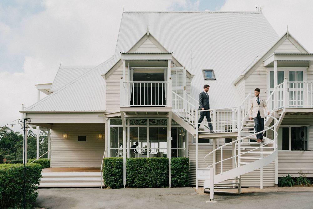 “Groom’s preparations at Maleny Manor, captured with documentary wedding photography, surrounded by nature.”