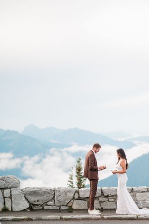 A couple in wedding exchanging vows at Sunrise, Mt. Rainier National Park
