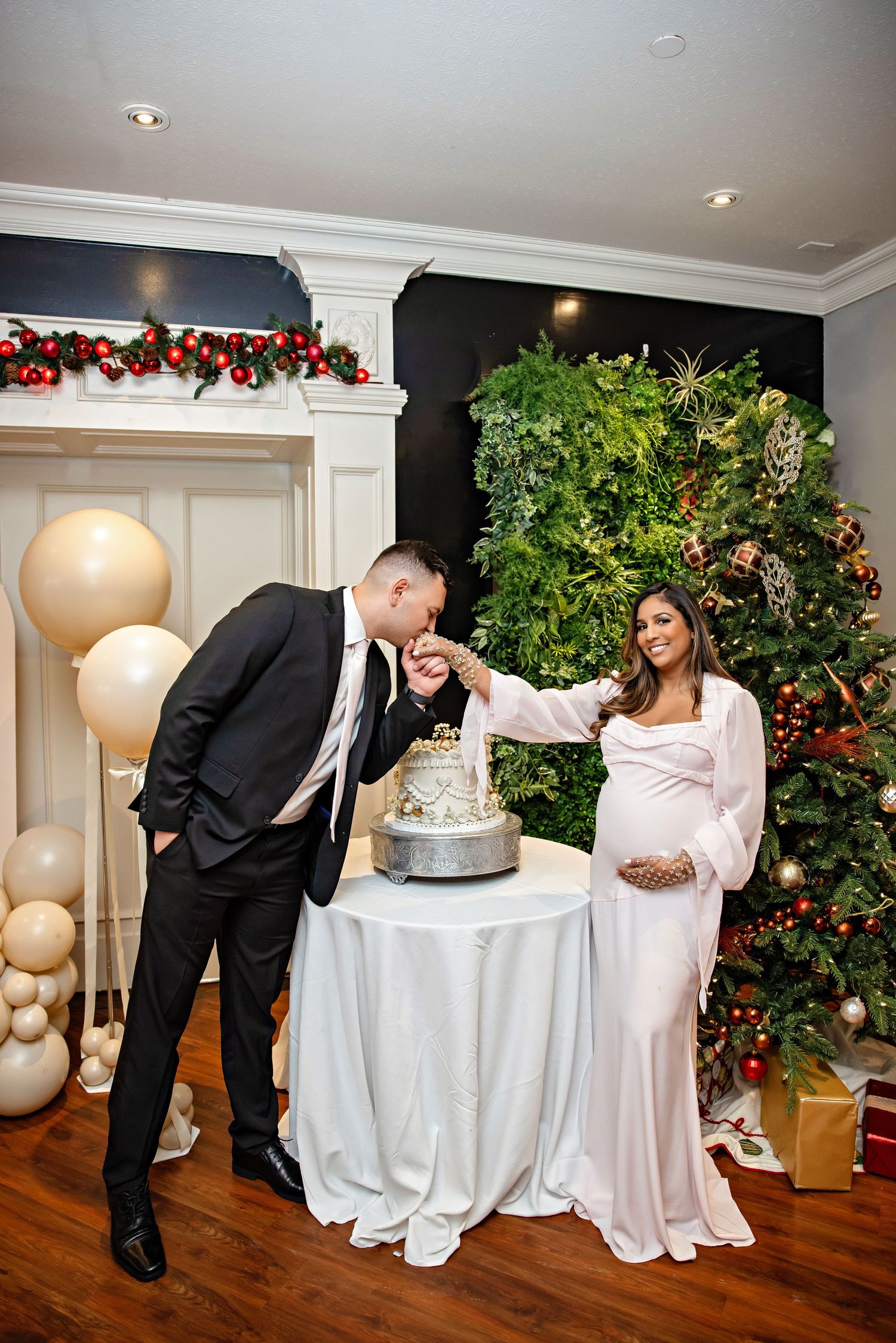 A romantic proposal scene set between rows of grapevines in a scenic vineyard with white flowers and a blanket.