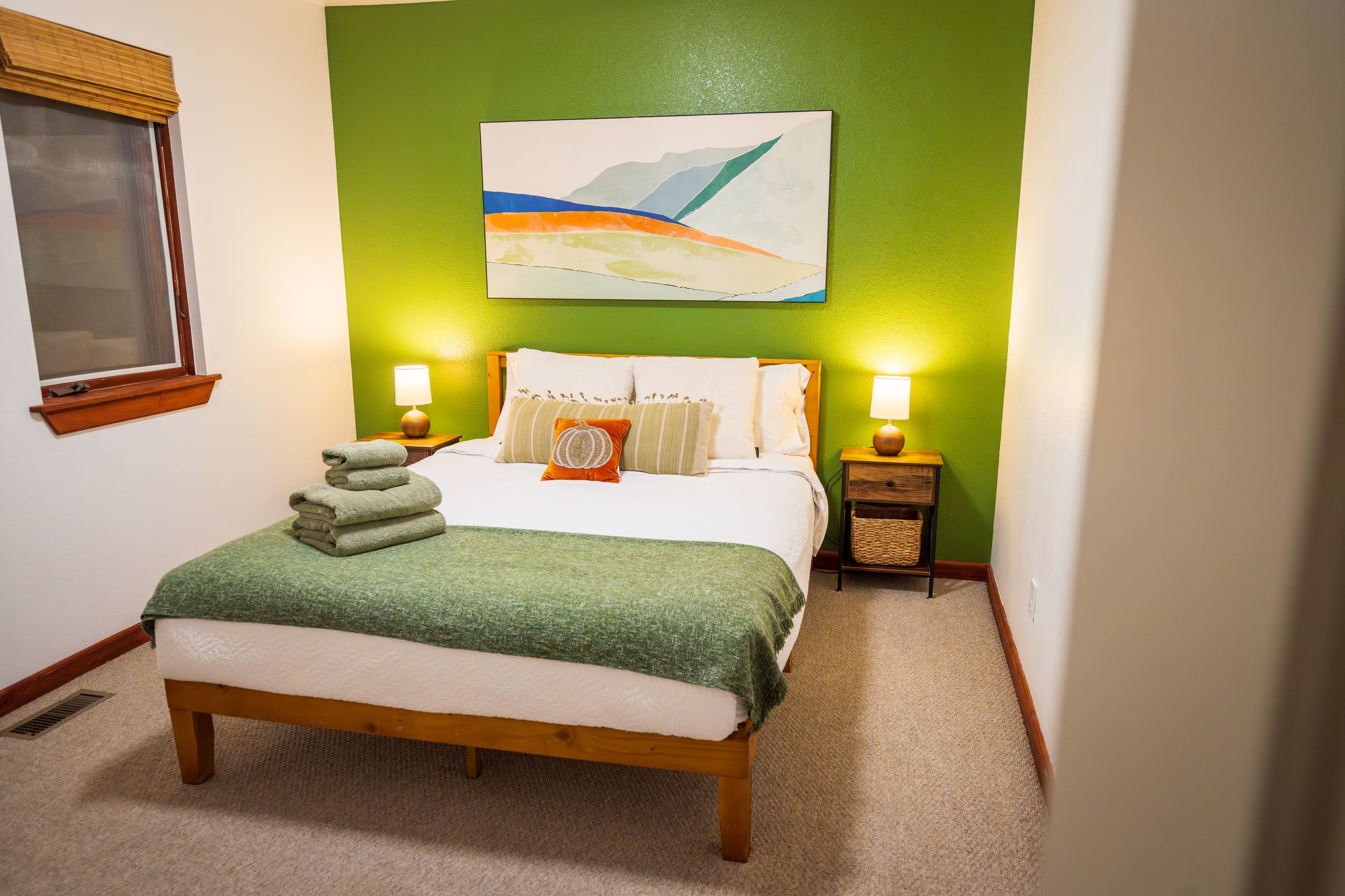 Image of a warm, cozy bedroom by Denver Hospitality, Travel & Tourism photographer Captain Colorado Photography.