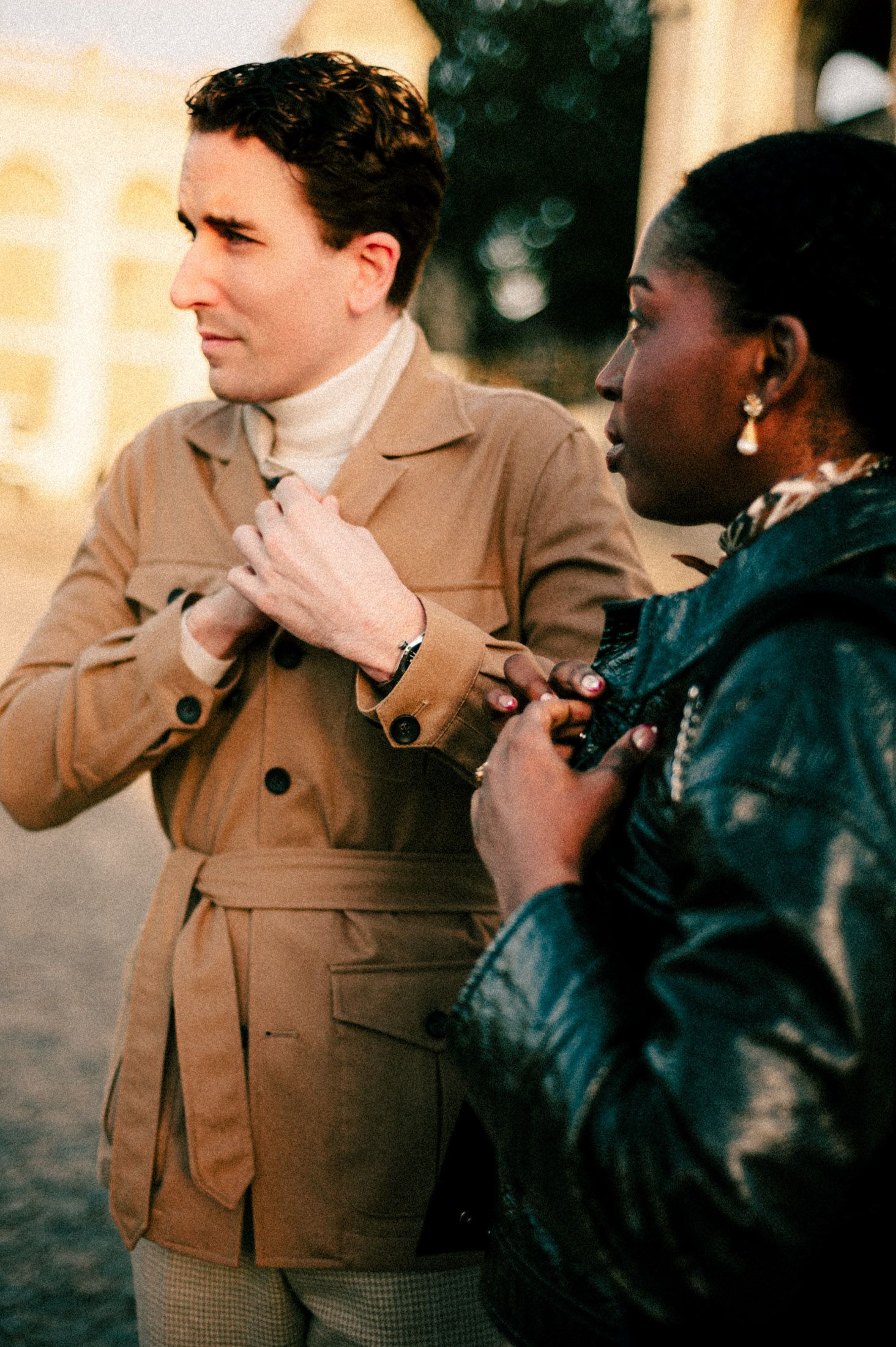 A series of candid photos showing two people in conversation, one wearing a beige coat and one in black.
