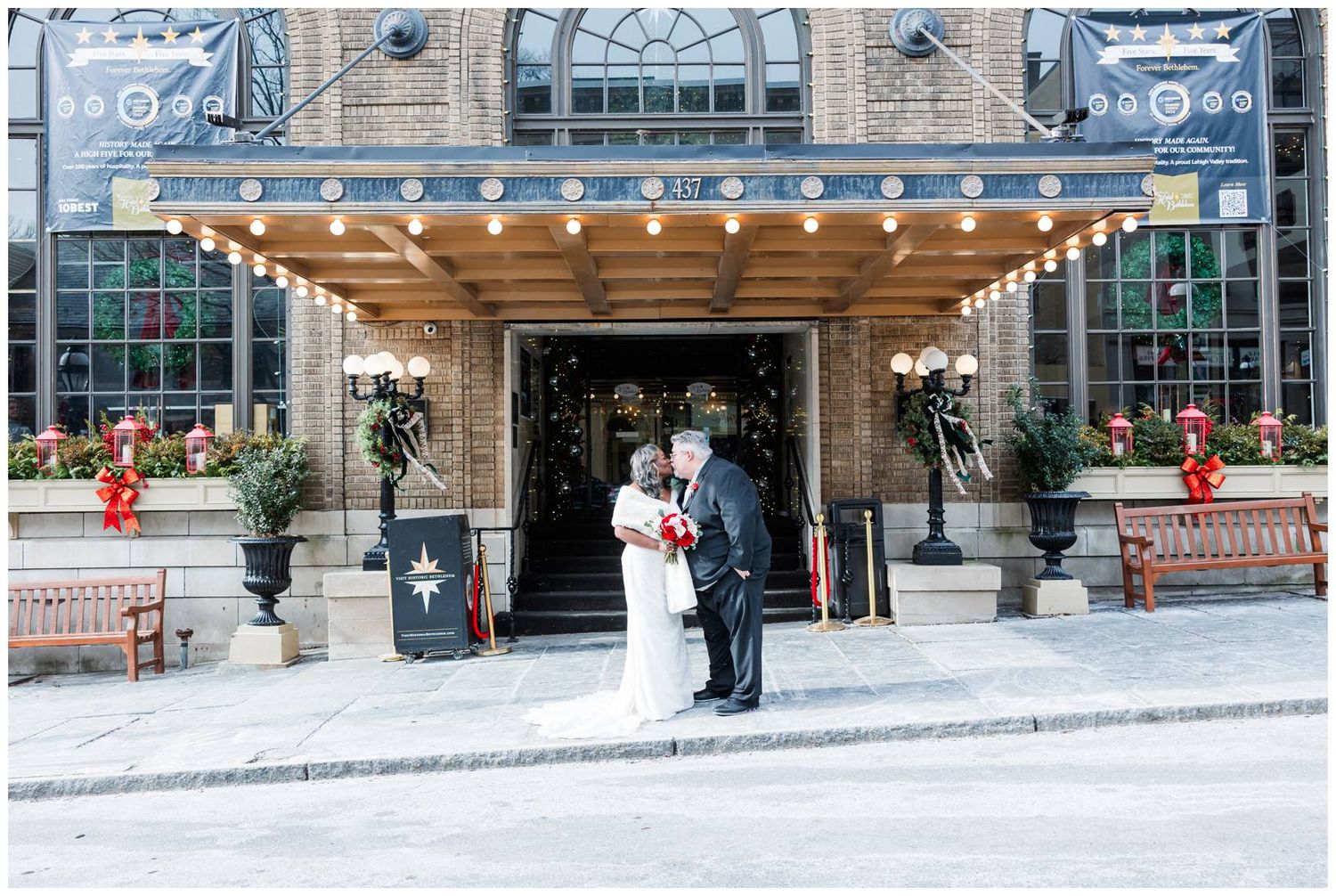 Elegant wedding reception venue with glass ceiling and modern architecture decorated for a formal celebration.