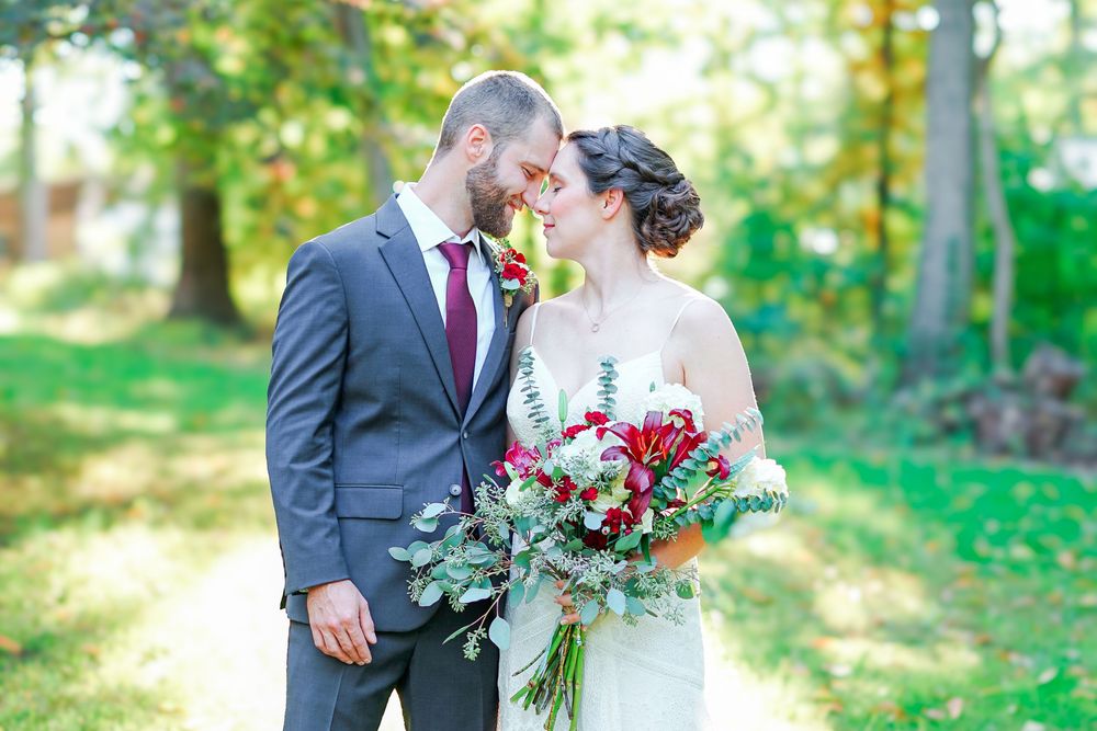 Tiffany and Andrew nuzzling during their wedding day