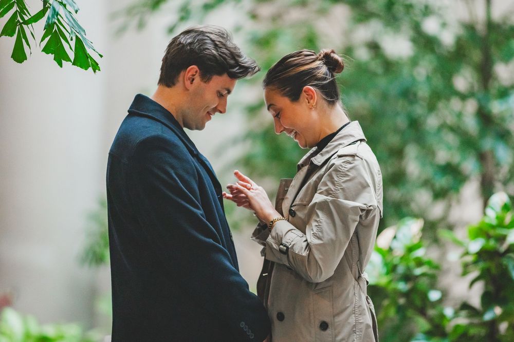 A couple shares an intimate moment at the garden of National Gallery of Art