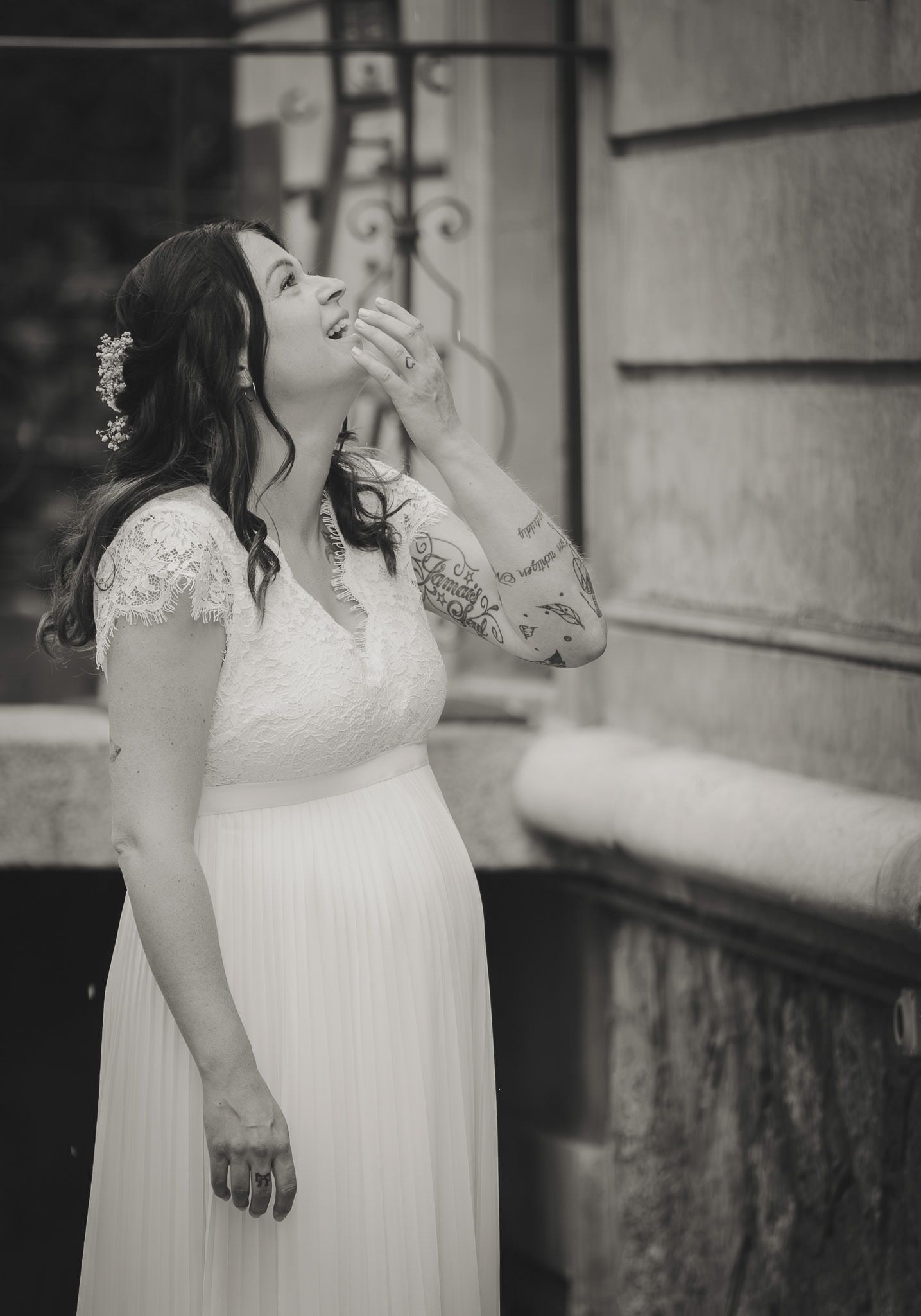 Black and white portrait series showing a woman in an elegant white dress.