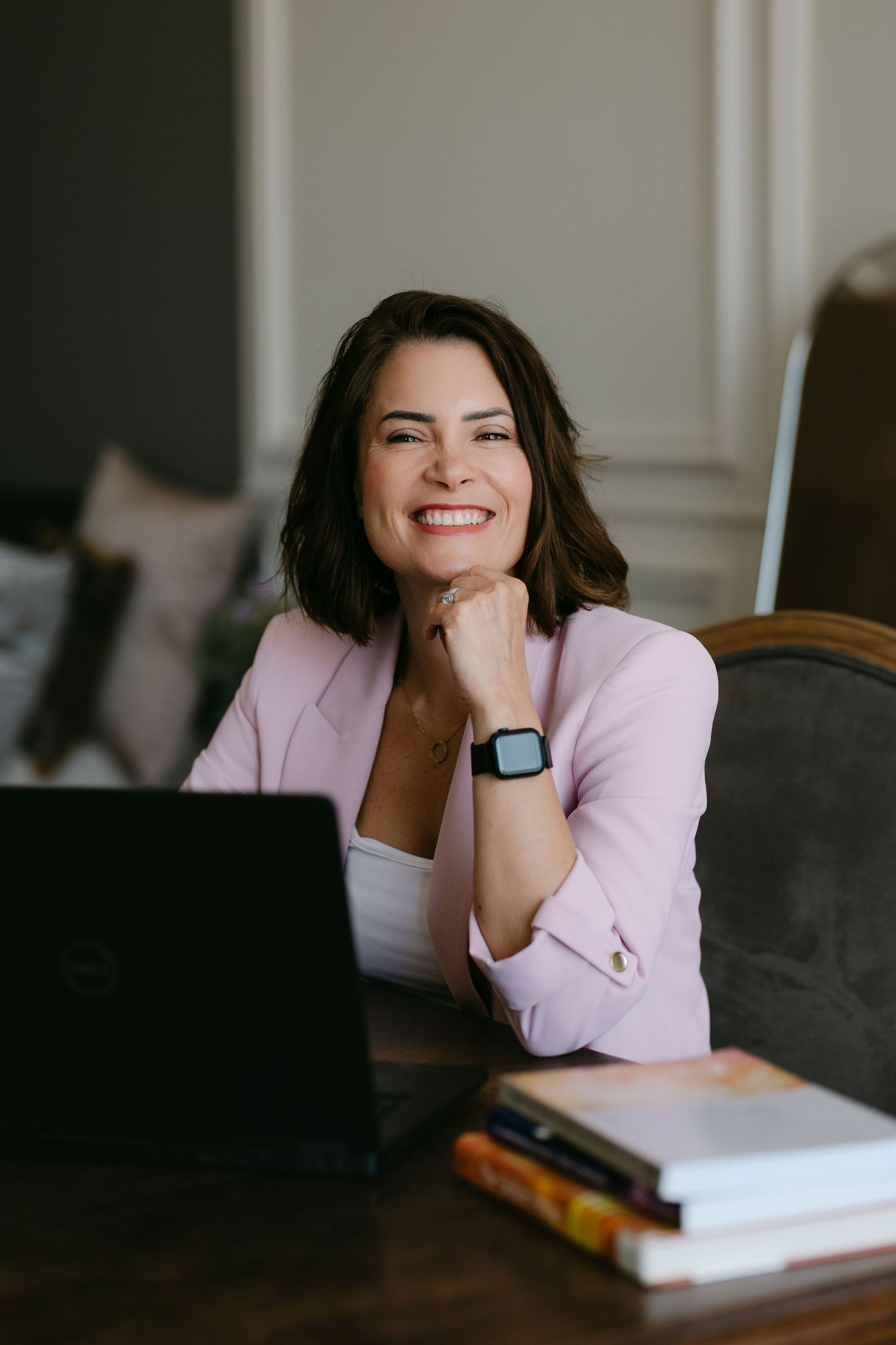 Studio personal branding photoshoot in Dubai – professional woman with laptop at desk