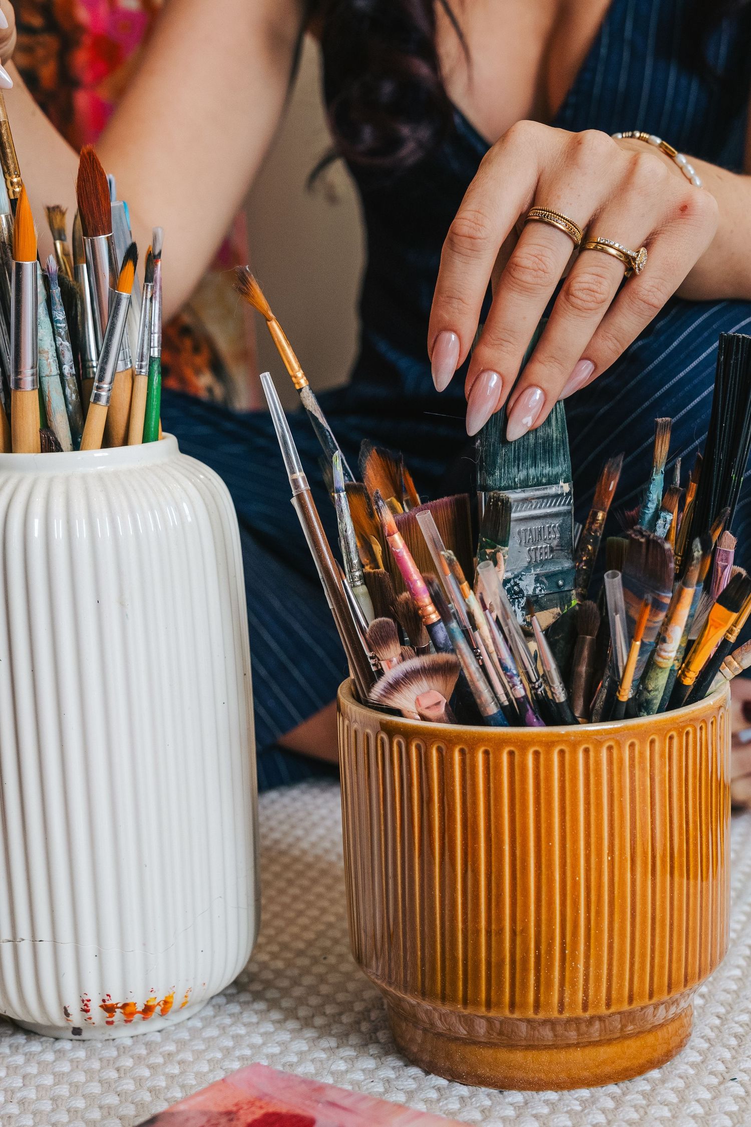 Detail shot of paintbrushes for artistic personal branding session