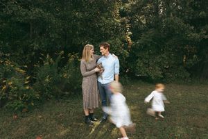 A series of candid outdoor wedding photos showing dancing and celebration in a wooded setting at dusk.