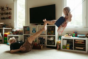 A collection of candid indoor scenes showing playful moments in a sunlit room with toys and furniture.