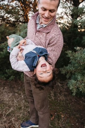 A series of heartwarming outdoor portraits showing playful interactions and genuine laughter between family members.