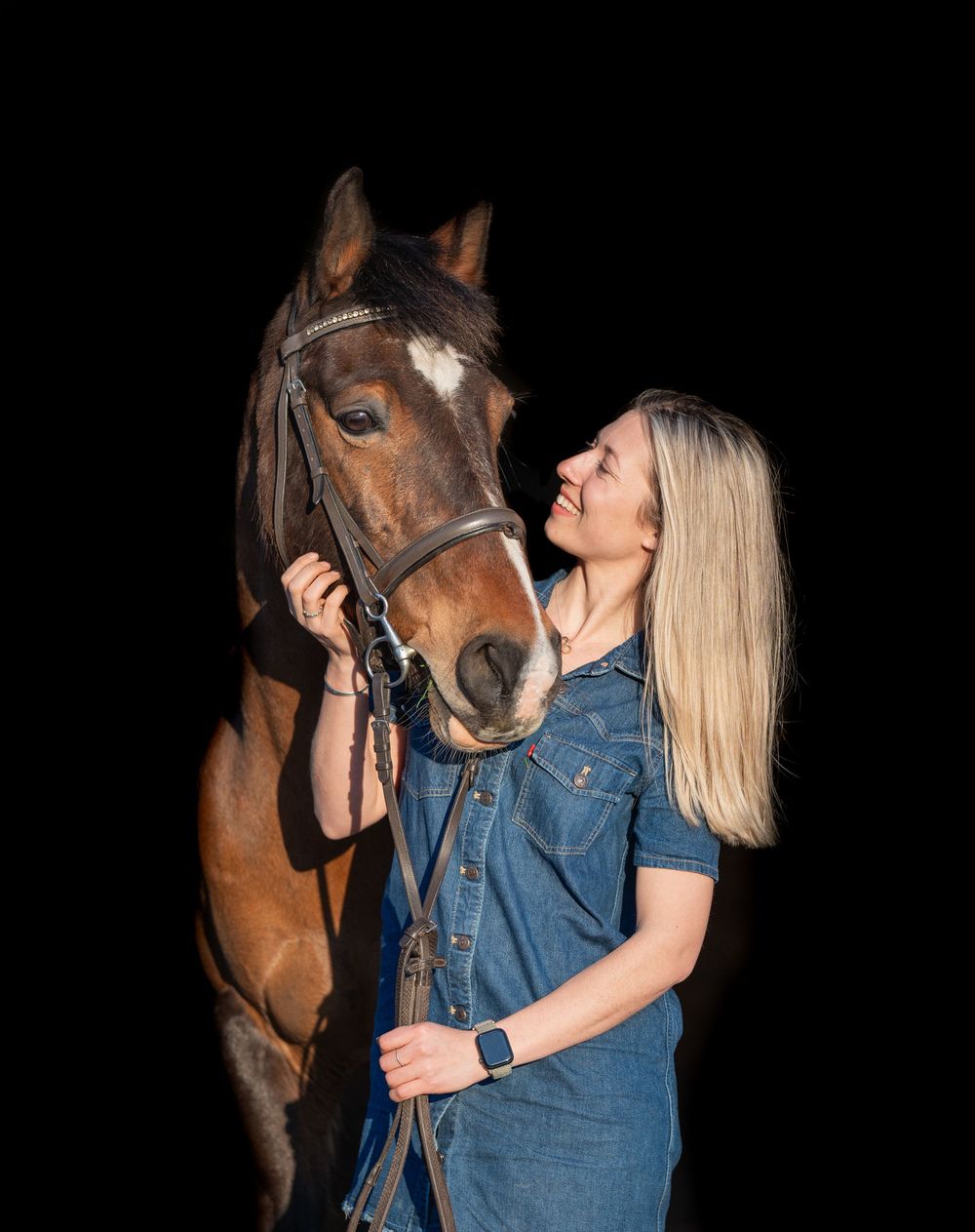 A person wearing denim interacts affectionately with a brown horse against a dark background in a series of photos.