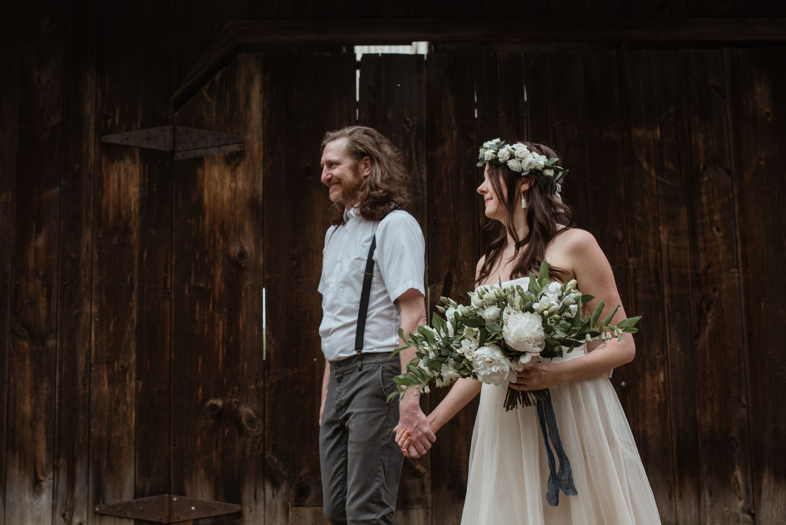 Rustic barn wedding photo in Black Saddle Barn by a Documentary Wedding Photographer and Photography Coach in Muskoka and NortBbay.