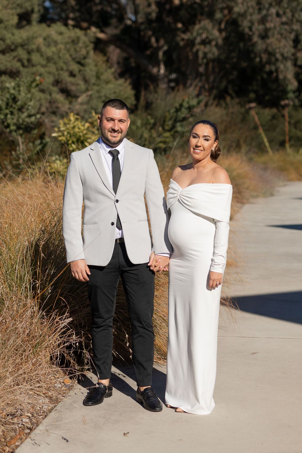 Natural candid portrait of newlyweds smiling after their wedding ceremony in Sydney