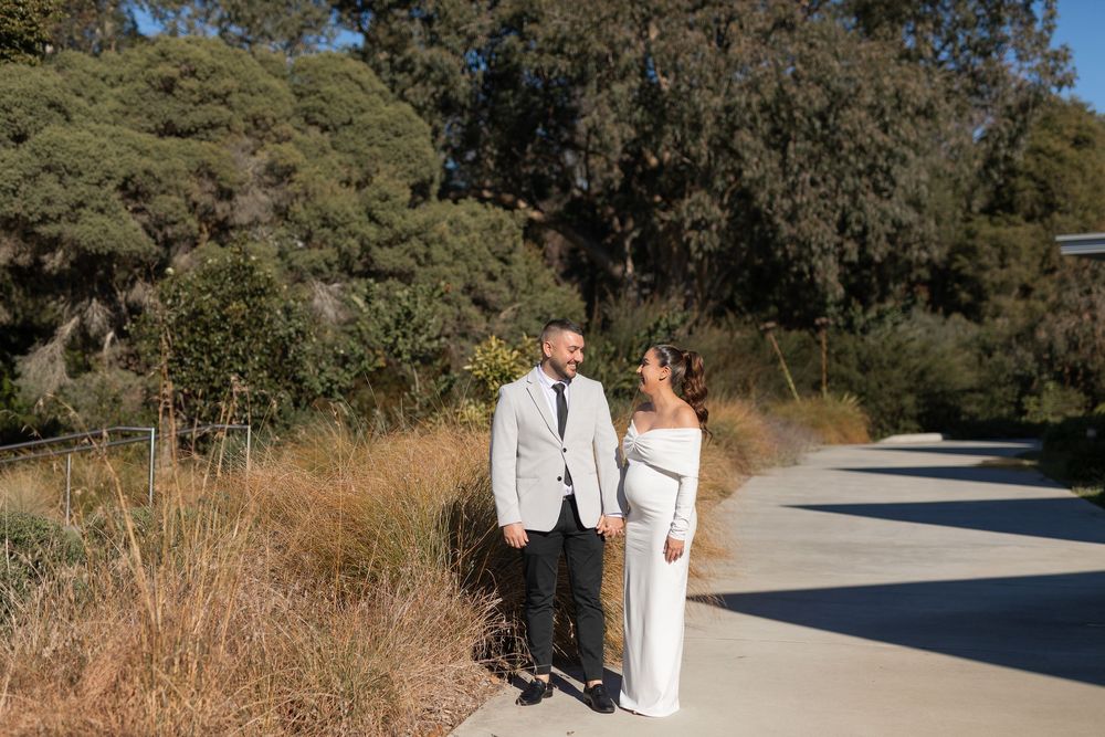 Natural candid portrait of newlyweds smiling after their wedding ceremony in Sydney