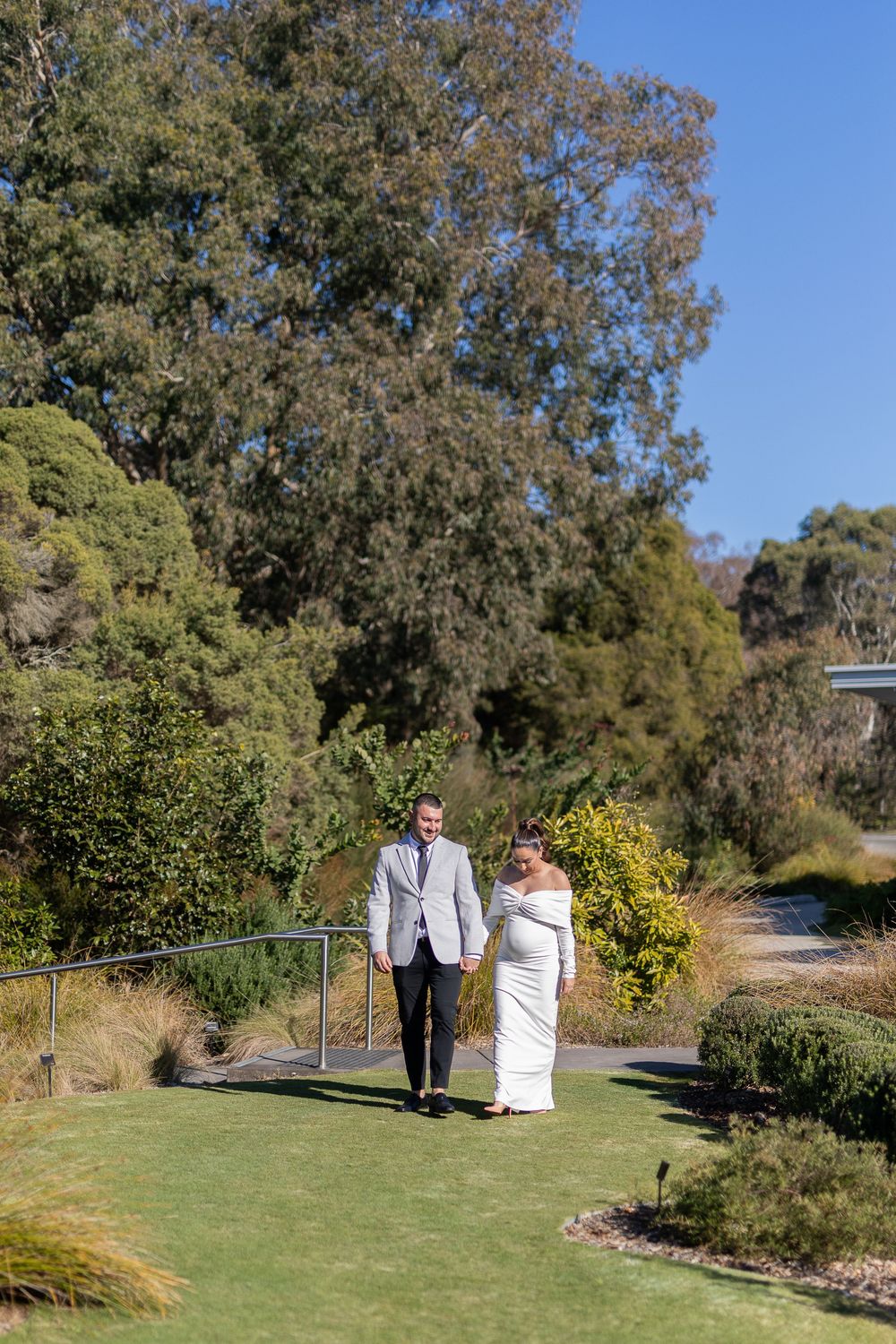 Natural candid portrait of newlyweds and maternity shoot and smiling after their wedding ceremony in Sydney