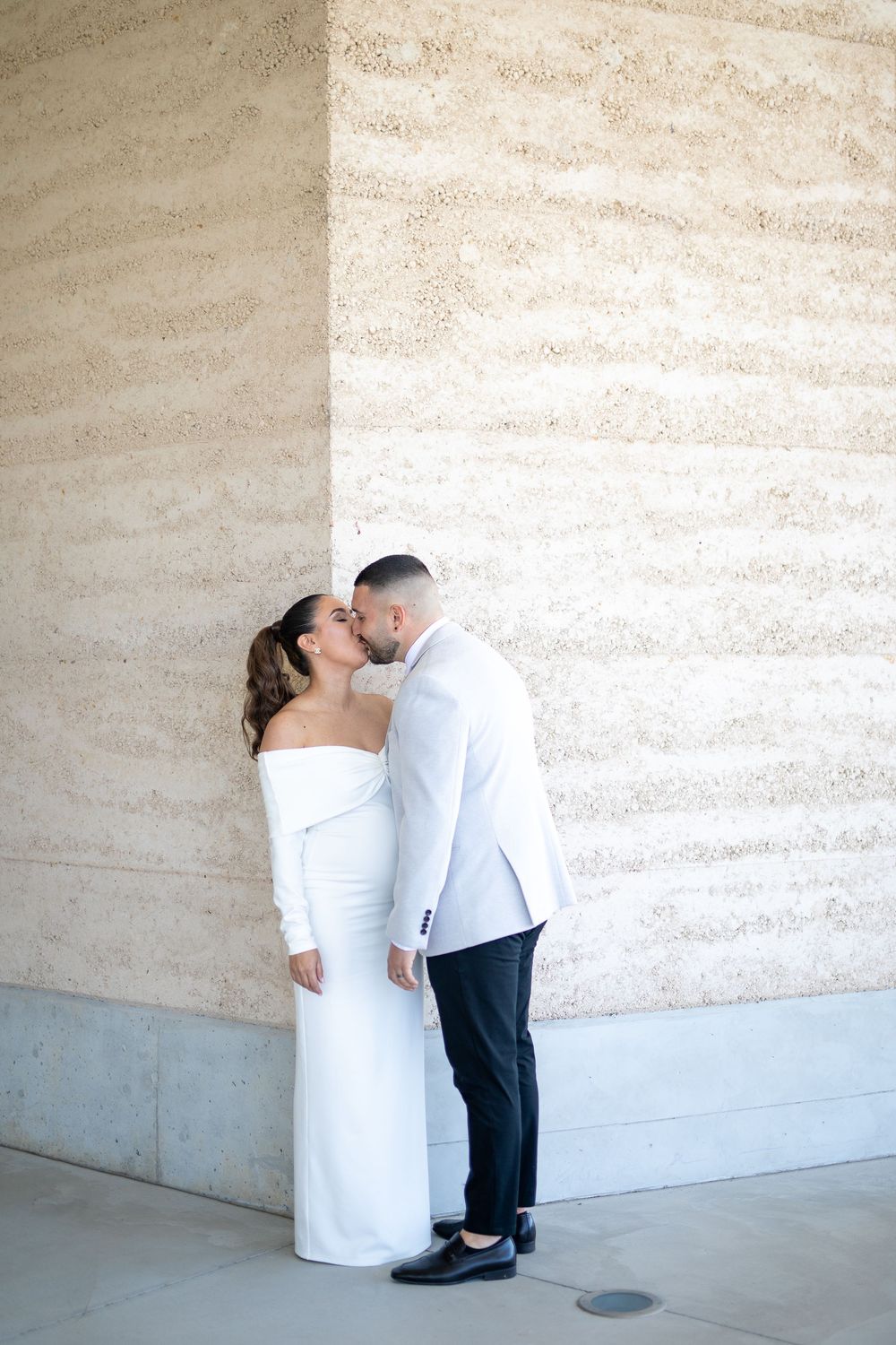 Natural candid portrait of newlyweds and maternity shoot and smiling after their wedding ceremony in Sydney
