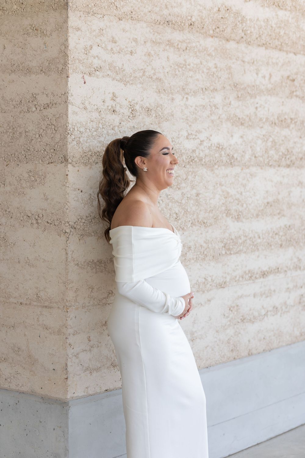Natural candid portrait of newlyweds and maternity shoot and smiling after their wedding ceremony in Sydney