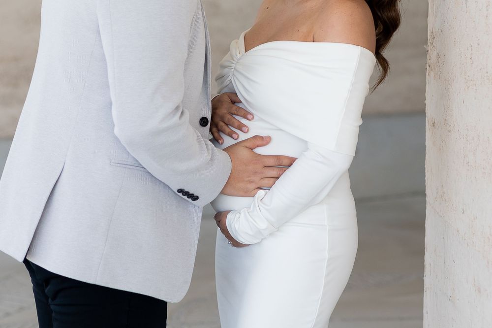Natural candid portrait of newlyweds and maternity shoot and smiling after their wedding ceremony in Sydney