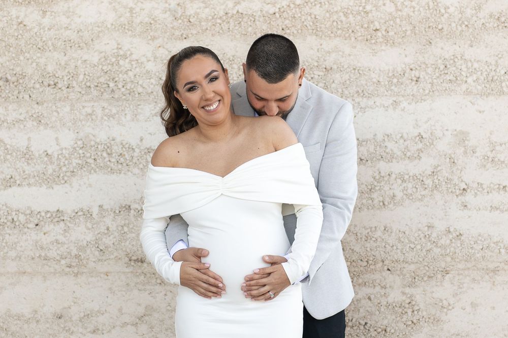 Natural candid portrait of newlyweds and maternity shoot and smiling after their wedding ceremony in Sydney