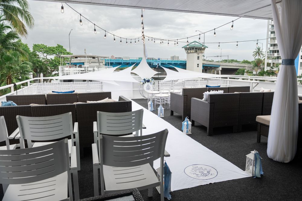 Group shot of guests on yacht deck during luxury Florida wedding