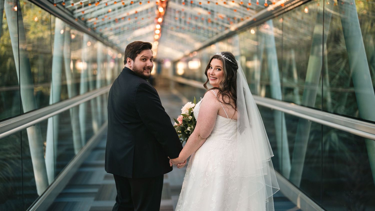 Romantic bride and groom portrait at sunset before the wedding ceremony at the Orlando Science center in Orlando, Florida.