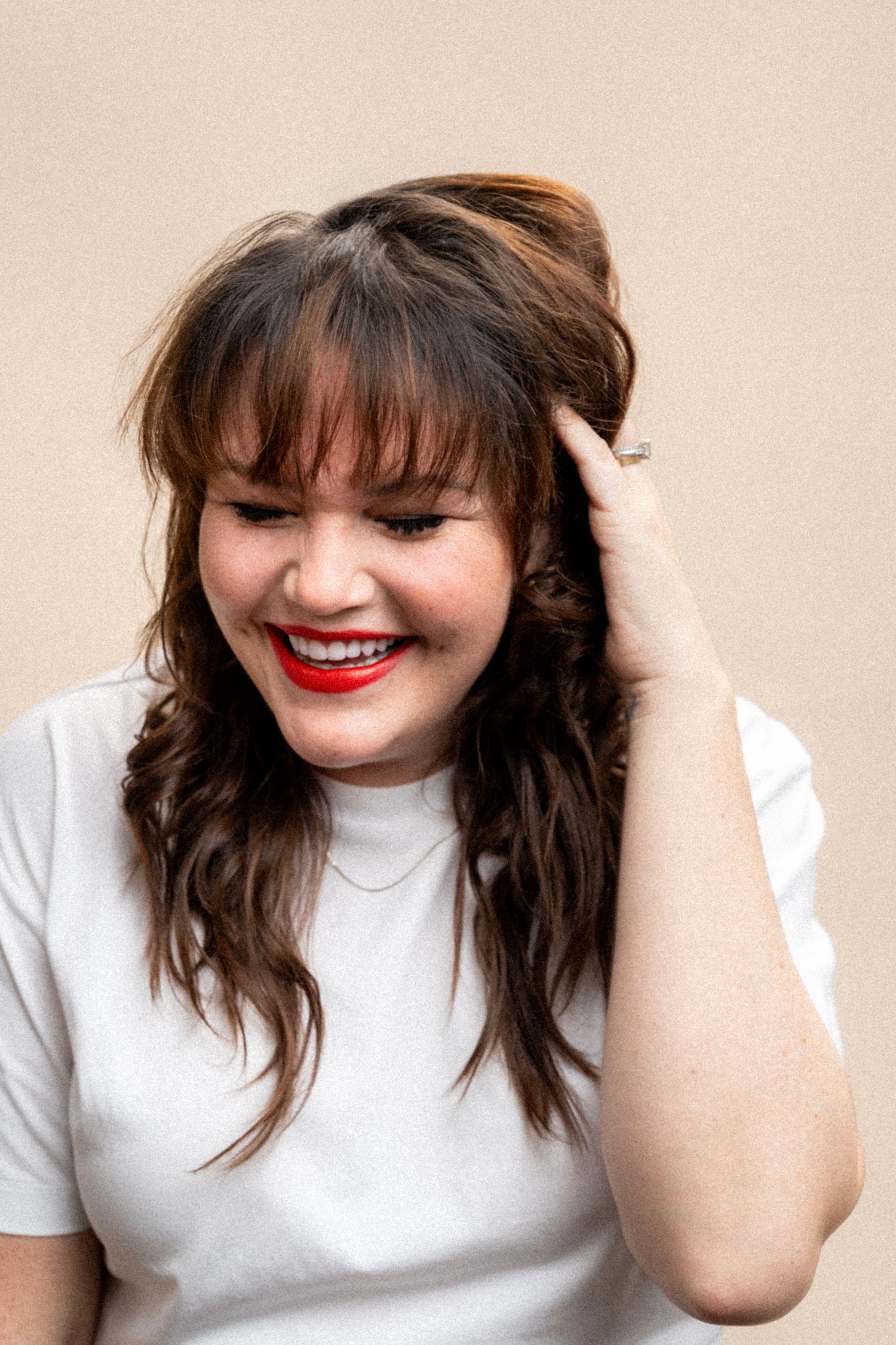 Portrait series showing natural expressions and movement in studio setting.