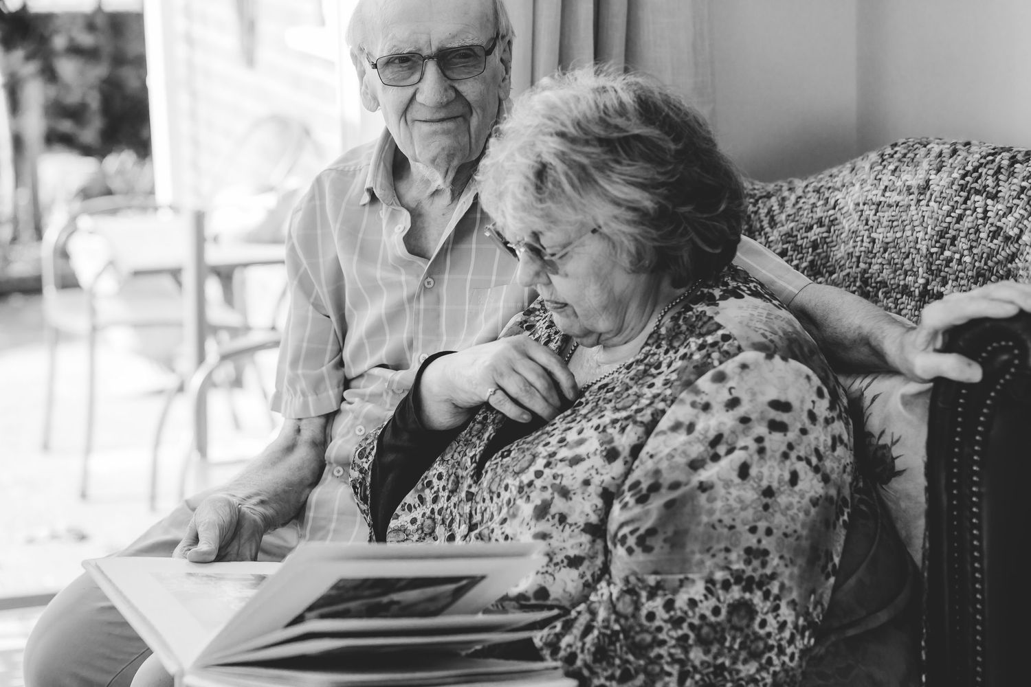 Indoor portrait of elderly couple sharing an intimate moment. Photographer. Hull. East Yorkshire. Photography