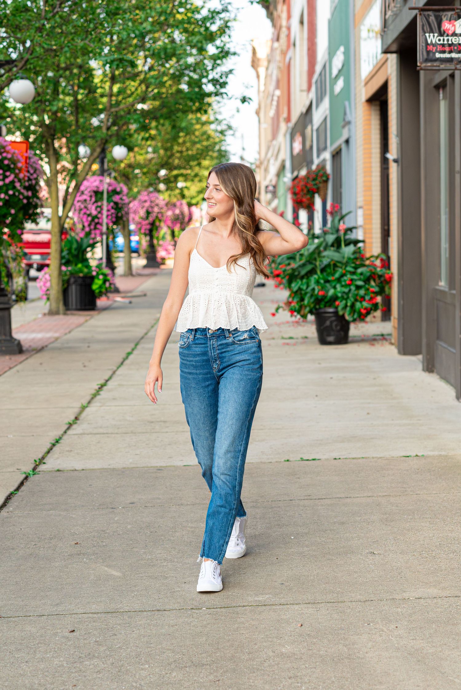 Senior photos walking in downtown warren in warren, ohio